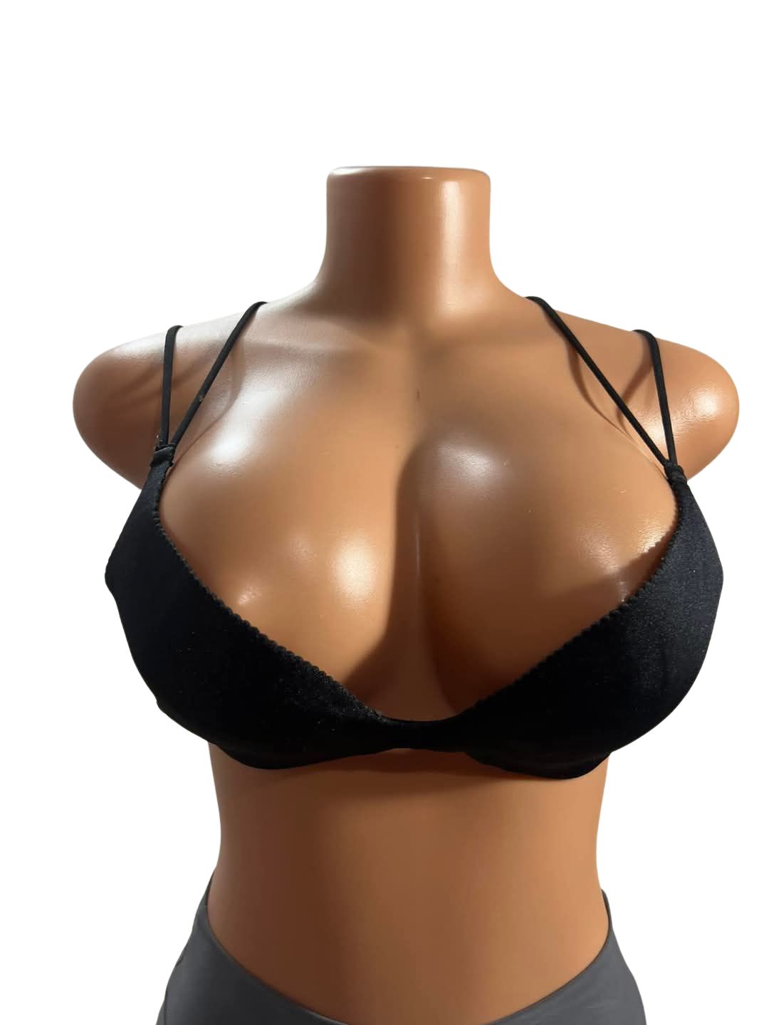 Front view of criss-cross back padded black bralette for women