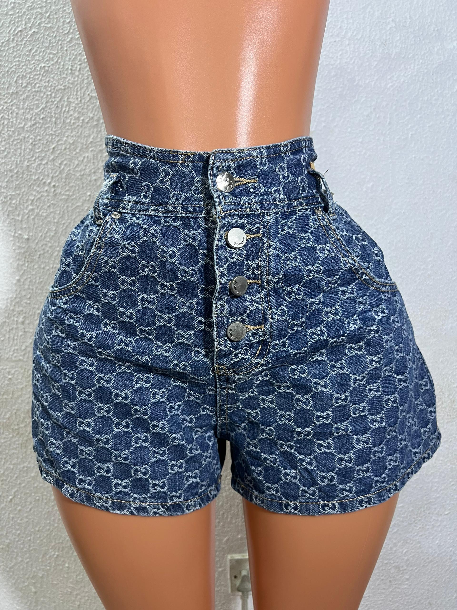SignatureMuse™ monogram print denim shorts with high-rise fit and four-button fly, size 8 for 27–28 inch waist